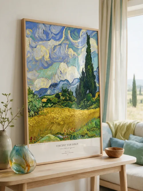Vincent van Gogh's "Wheat Field with Cypresses," a landscape poster featuring a golden-yellow wheat field, dark cypress trees, and a wavy blue sky