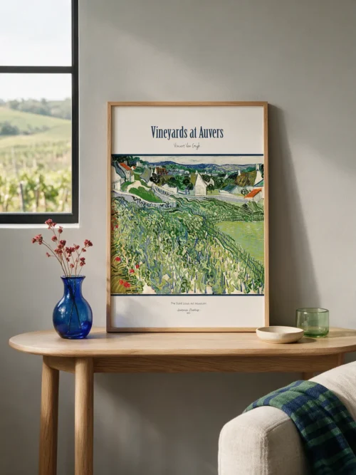 "Vincent van Gogh Vineyards at Auvers" poster featuring winding vineyards, red poppies, white houses, and the Auvers countryside