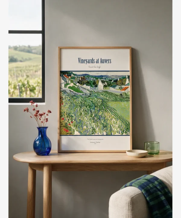 "Vincent van Gogh Vineyards at Auvers" poster featuring winding vineyards, red poppies, white houses, and the Auvers countryside