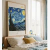 Vincent van Gogh's "The Starry Night": A poster featuring a swirling blue night sky, bright stars, a cypress tree, and a village landscape