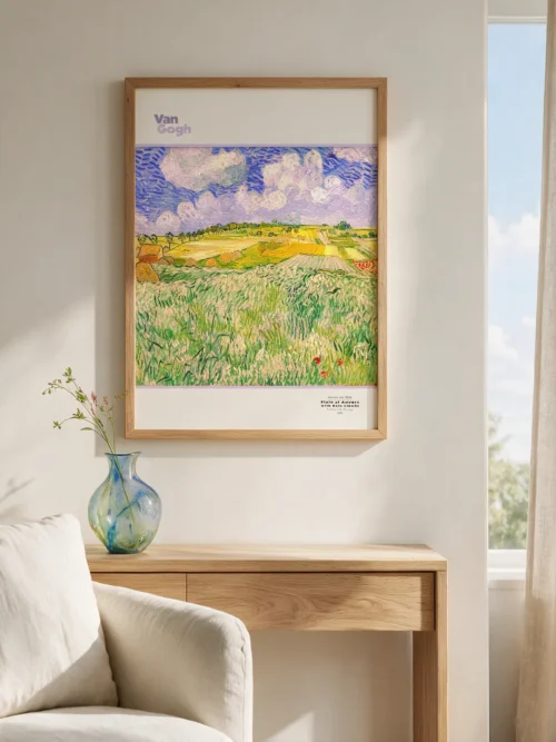 Vincent van Gogh's "Plain at Auvers," a landscape poster featuring vast wheat fields, haystacks, and a cloudy sky